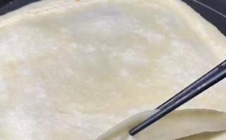 手把手教你制作薄如纸的春饼（从面团制作到烘焙，轻松做出口感酥脆的春饼）