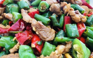 双椒炒肉的秘诀（如何让你的双椒炒肉更加美味）