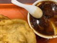 学会如何制作美味糖油饼儿（用简单方法让你轻松掌握制作技巧）