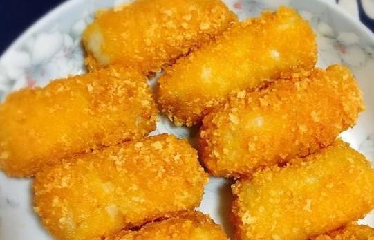 酥炸香蕉的制作方法详解（如何做出口感酥脆、内部柔软的香蕉甜点）-第2张图片-美味行家