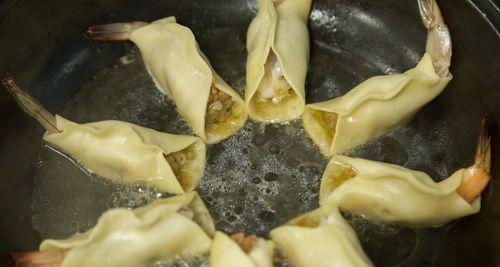 美味早餐，煎饺出奇招！（如何制作口感香脆的煎饺？——分享经典家常煎饺做法！）-第2张图片-美味行家
