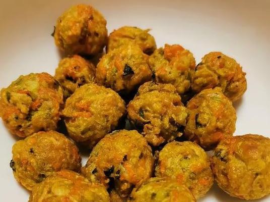 团团圆圆大丸子的做法（家庭美食不可少的秘诀，让你轻松打造美味丸子）-第2张图片-美味行家