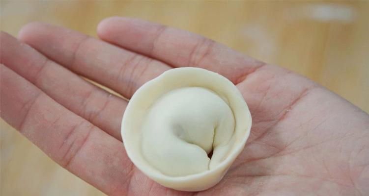 四种饺子包法，一次学会！（四种不同包法，让你轻松打造完美饺子宴！）-第1张图片-美味行家