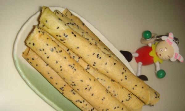 学会制作美味的芝麻鸡蛋卷（用新鲜鸡蛋和香浓芝麻口感更佳）-第1张图片-美味行家