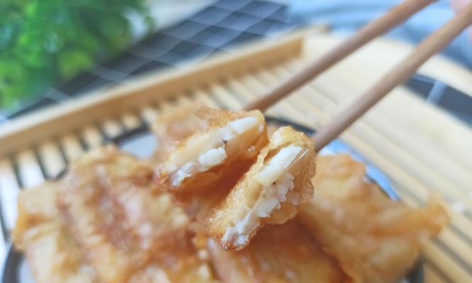 手把手教你做美味的以酥带鱼（家庭厨房也能做出餐馆级别的美食，一起来学做以酥带鱼吧！）-第1张图片-美味行家