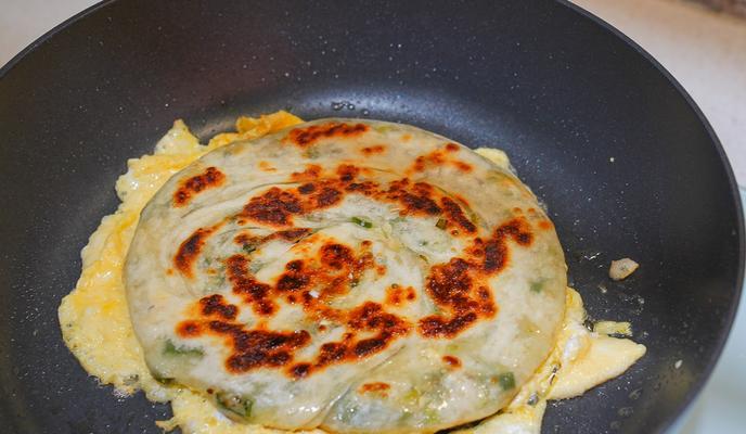 掌握意式葱卷饼的制作方法（一步步教你制作口感香脆的意式葱卷饼）-第1张图片-美味行家