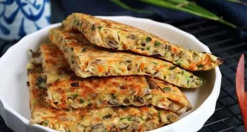 用营养鸡蛋打造美味煎饼（做法详解，让你轻松拥有口感独特的鸡蛋煎饼）-第2张图片-美味行家