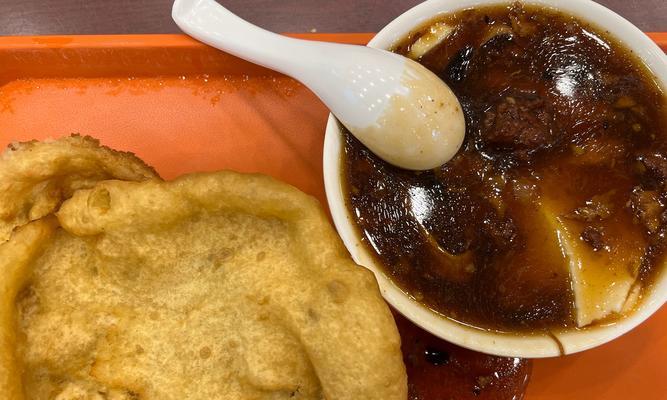 学会如何制作美味糖油饼儿（用简单方法让你轻松掌握制作技巧）-第1张图片-美味行家